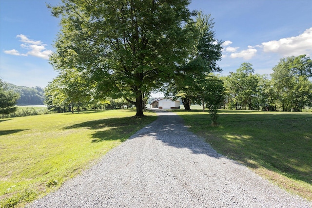 exterior space featuring a front yard