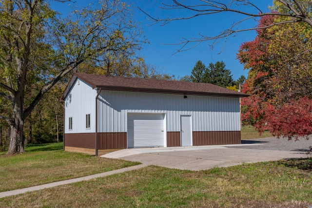 garage with a yard