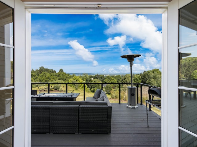 deck featuring outdoor lounge area