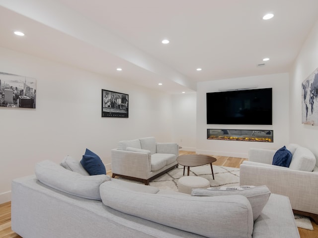 living room with light hardwood / wood-style floors