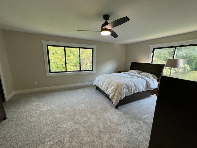 bedroom featuring ceiling fan and carpet flooring