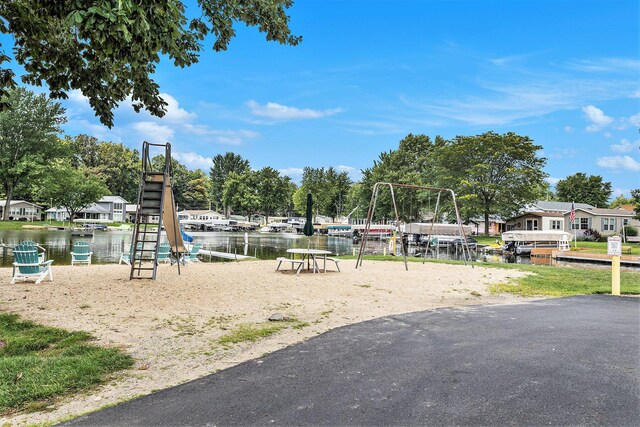 486 Maple Ln, Coldwater, MI 49036 - view of playground featuring a water view