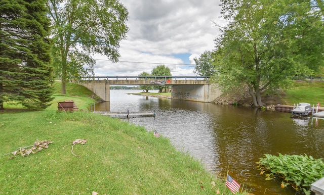 property view of water featuring a dock