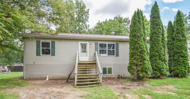 view of front of house with a front lawn