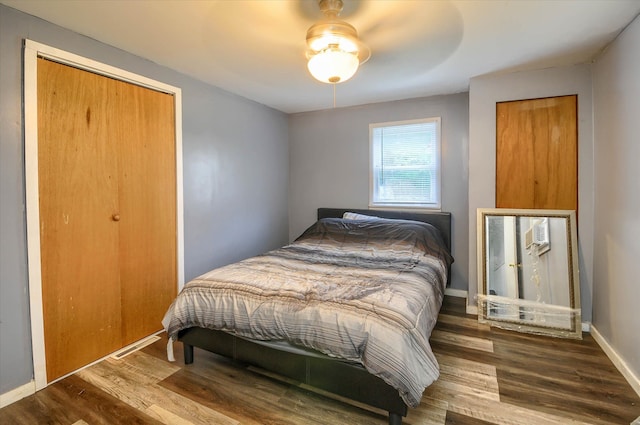 bedroom featuring ceiling fan and wood-type flooring