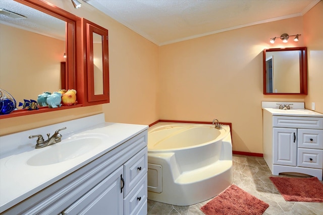 bathroom with a textured ceiling, vanity, a tub to relax in, and crown molding