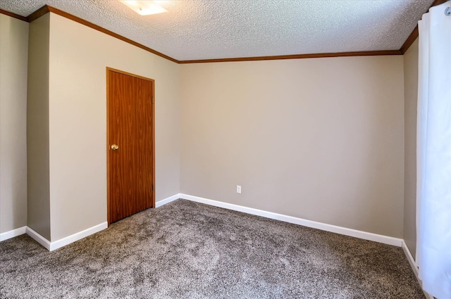 carpeted spare room featuring crown molding and a textured ceiling