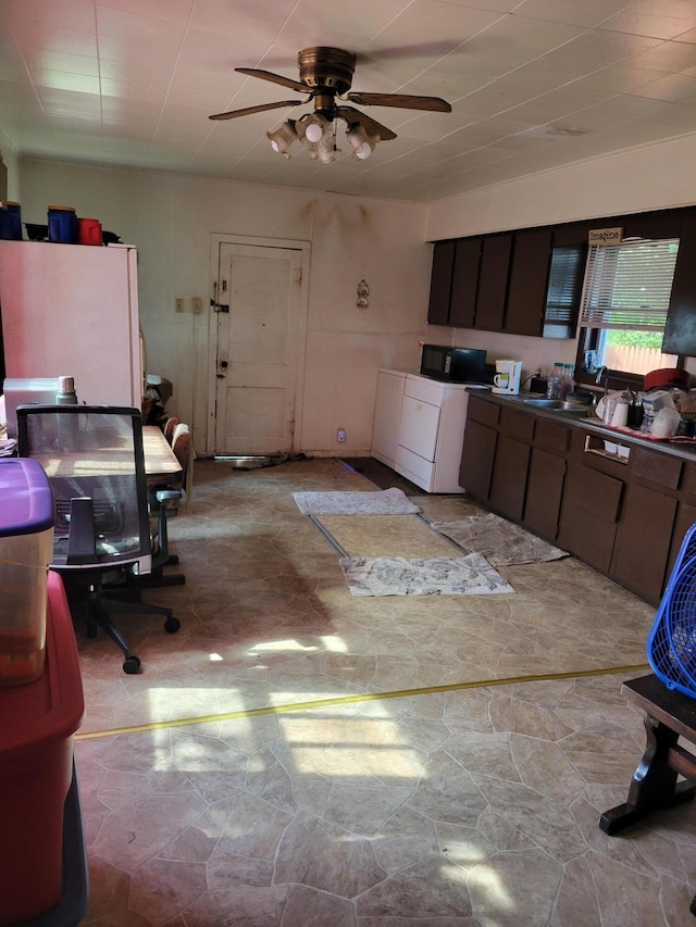 437 Ada Ave, Muskegon, MI 49442 - kitchen with a ceiling fan, washer / clothes dryer, and a sink