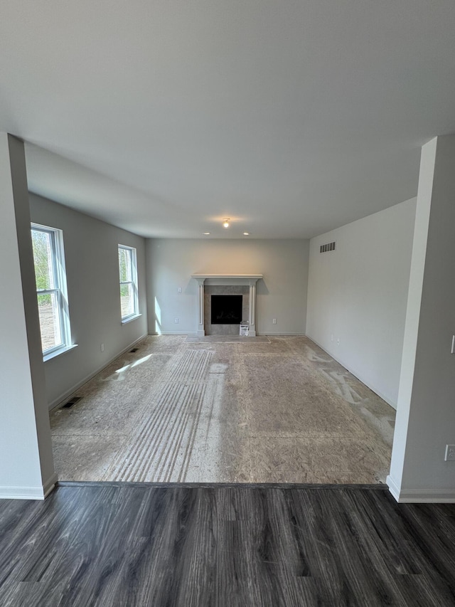 1476 Weeping Willow Ct, Ypsilanti, MI 48198 - unfurnished living room with wood finished floors, baseboards, and a fireplace