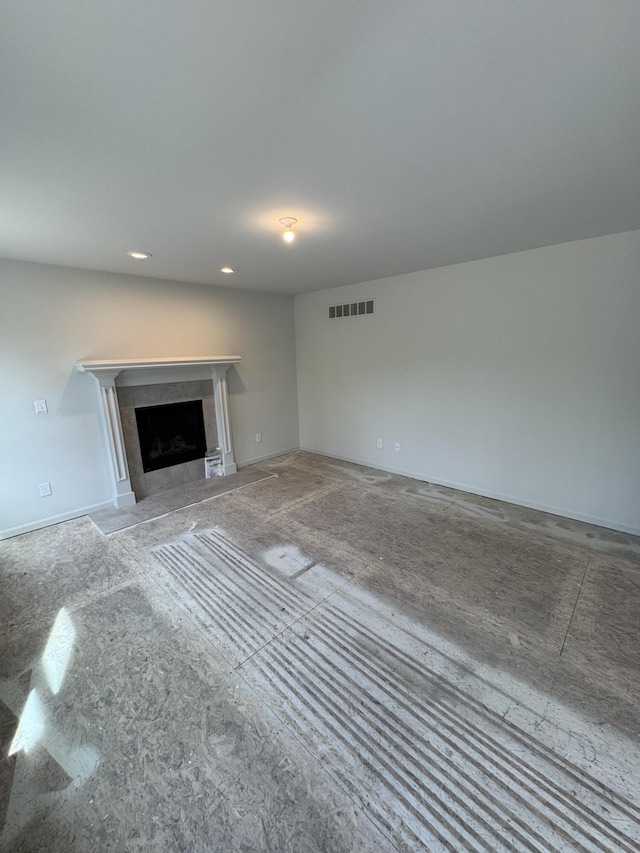 1476 Weeping Willow Ct, Ypsilanti, MI 48198 - unfurnished living room with a tiled fireplace and recessed lighting