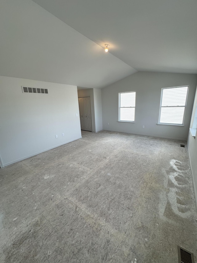 1476 Weeping Willow Ct, Ypsilanti, MI 48198 - unfurnished room with vaulted ceiling and baseboards