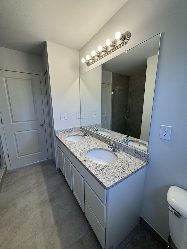 1476 Weeping Willow Ct, Ypsilanti, MI 48198 - bathroom featuring double vanity, toilet, and a stall shower