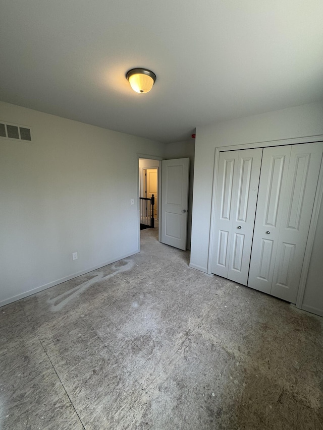 1476 Weeping Willow Ct, Ypsilanti, MI 48198 - unfurnished bedroom with a closet, baseboards, and carpet floors