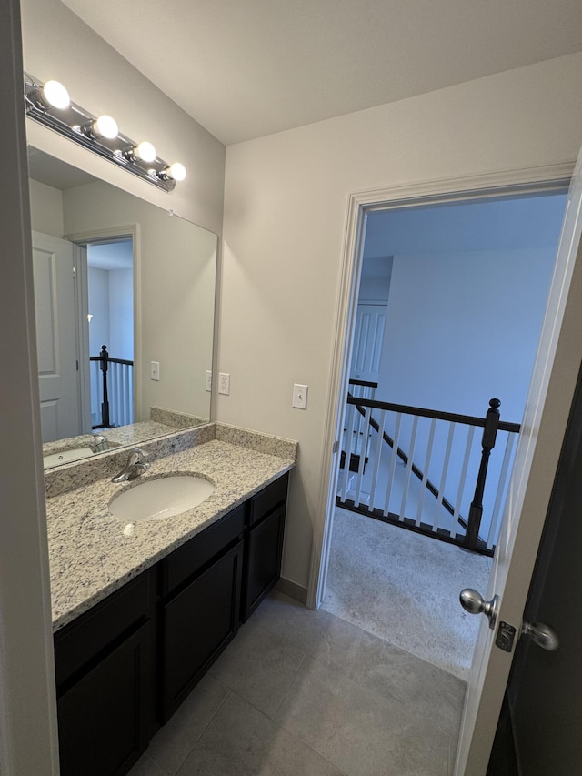 1476 Weeping Willow Ct, Ypsilanti, MI 48198 - bathroom with vanity, tile patterned floors, and baseboards