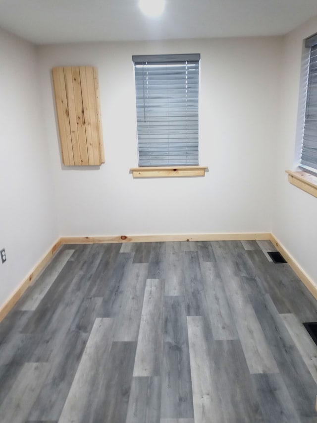 empty room featuring dark hardwood / wood-style floors