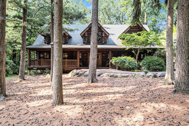 view of log cabin