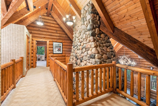 corridor with wood ceiling, light carpet, log walls, and a chandelier