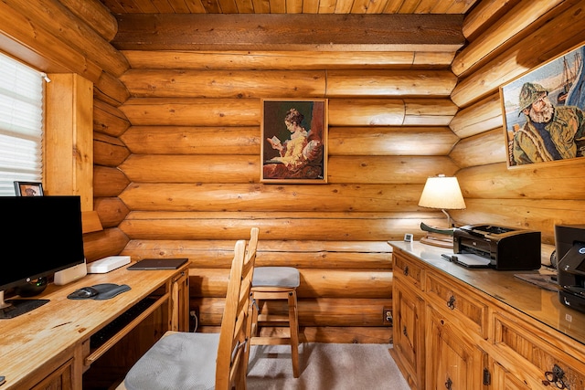 carpeted office featuring log walls and beamed ceiling