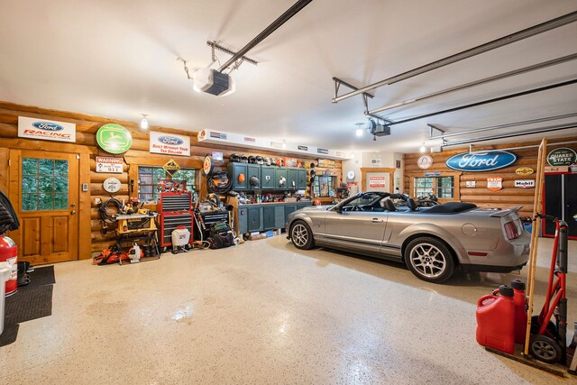 11245 Guyn Dr, Brighton, MI 48114 - garage featuring a garage door opener