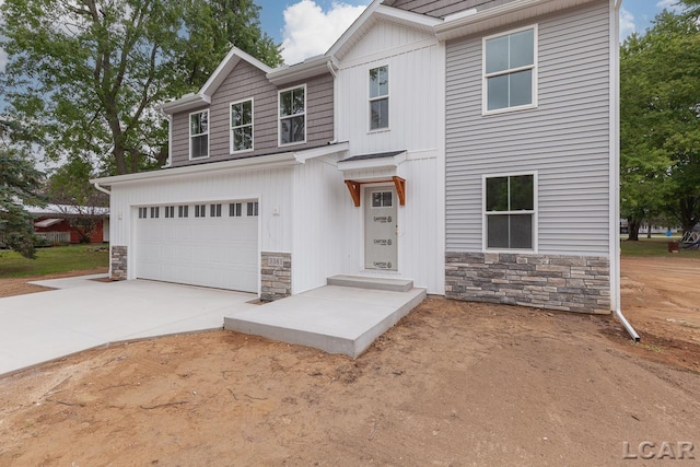 view of front of property featuring a garage