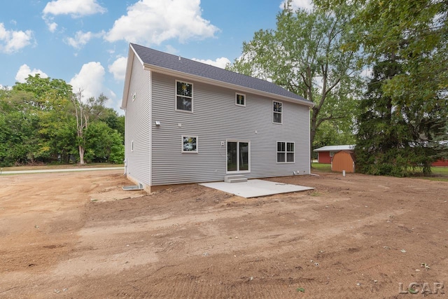 rear view of property featuring a patio