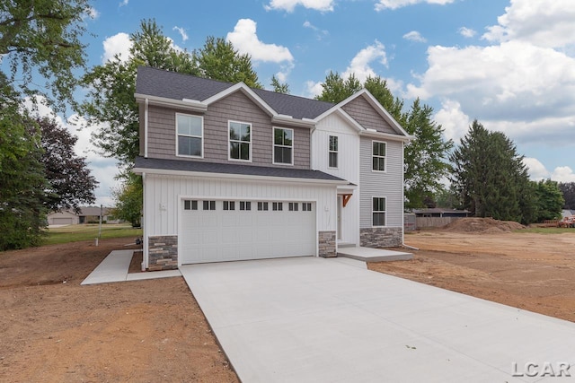 view of front of property featuring a garage