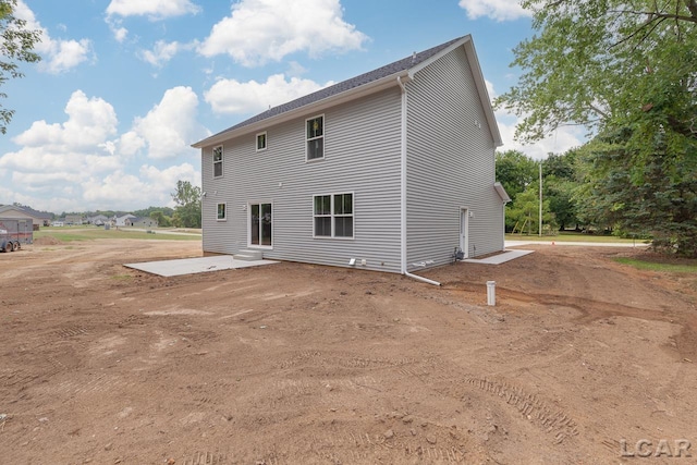 back of house with a patio area