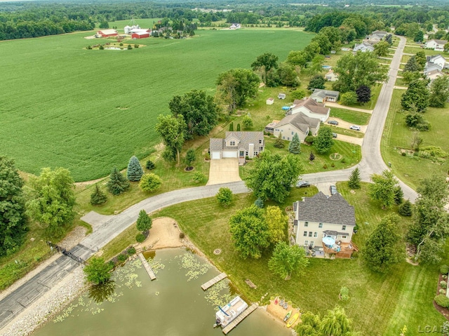 bird's eye view featuring a rural view and a water view