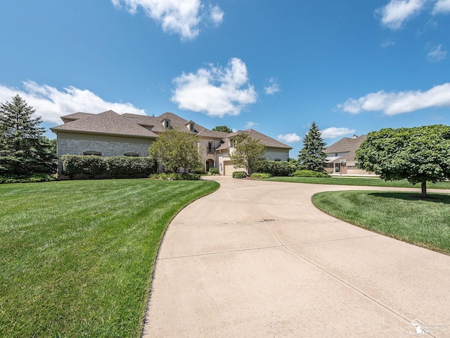 view of front of home with a front lawn