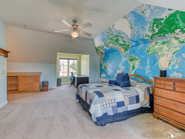 carpeted bedroom with ceiling fan and lofted ceiling