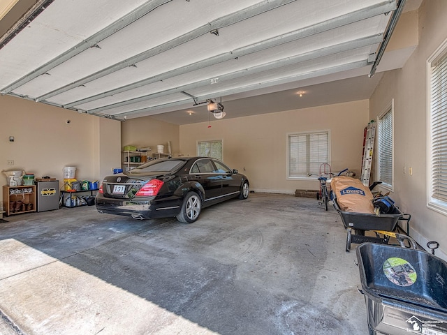 garage featuring a garage door opener