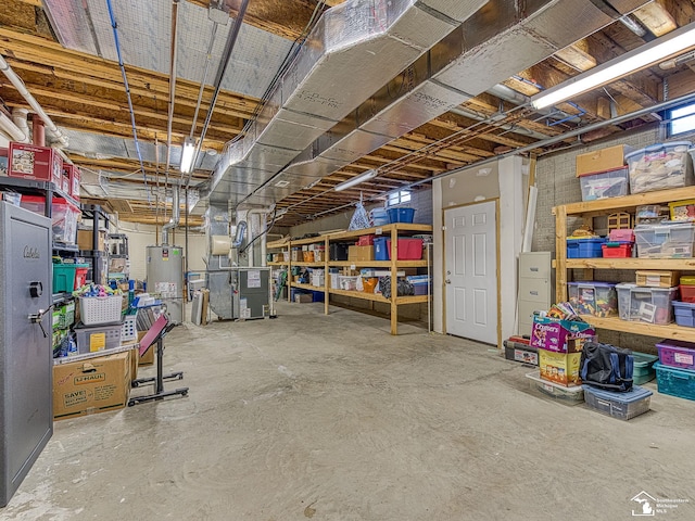 basement with heating unit and gas water heater