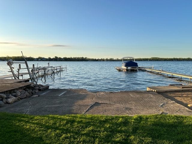 dock area with a water view