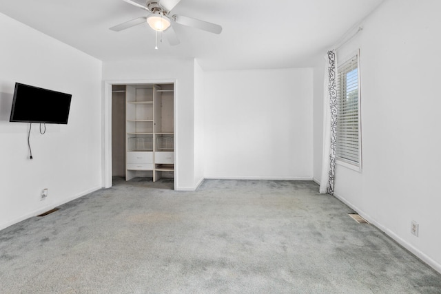 unfurnished bedroom with light carpet and ceiling fan