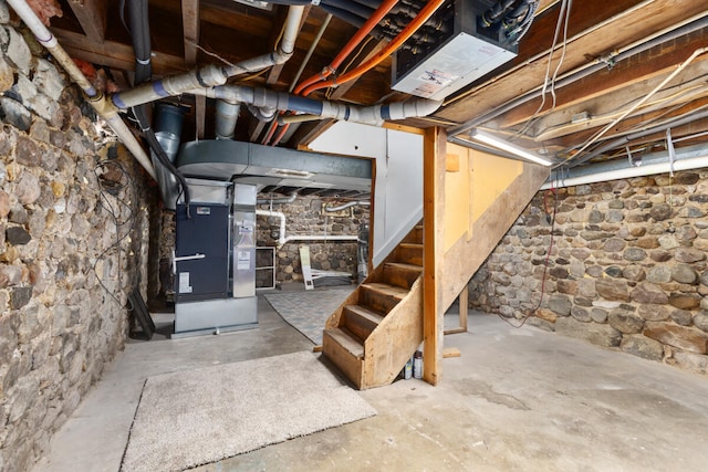 basement featuring heating unit