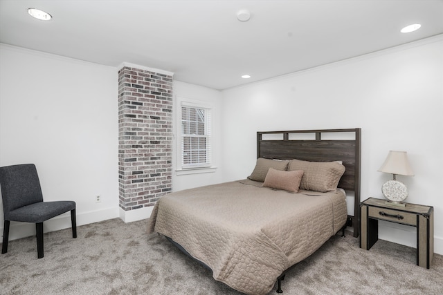 carpeted bedroom with crown molding