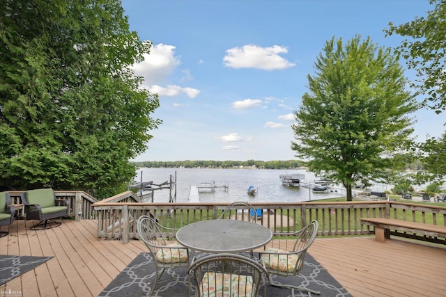 wooden deck with a water view