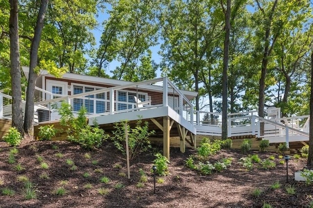 rear view of house with a deck