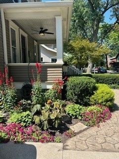 exterior space featuring covered porch and ceiling fan