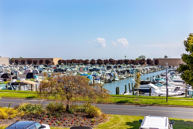 property view of water featuring a boat dock