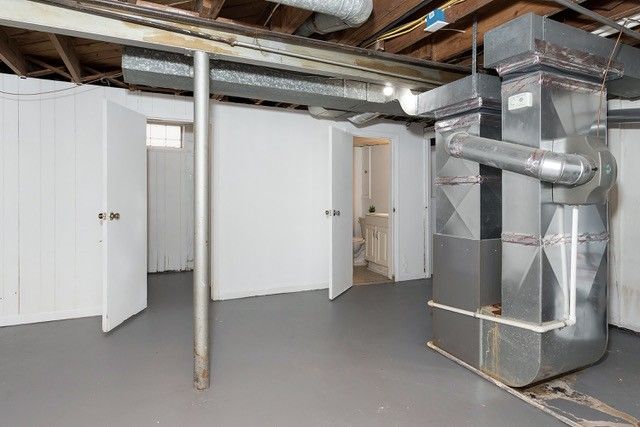 8410 Grandville Ave, Detroit, MI 48228 - below grade area featuring heating unit