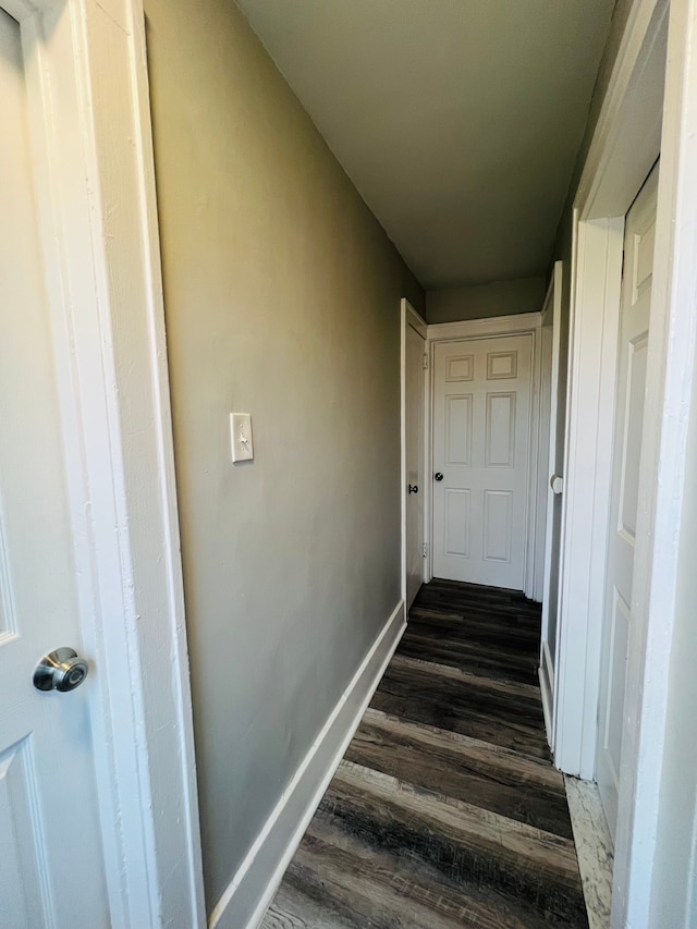 staircase featuring hardwood / wood-style flooring