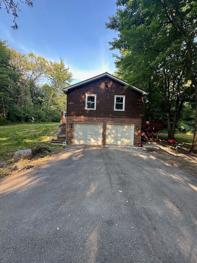 view of side of property featuring a garage