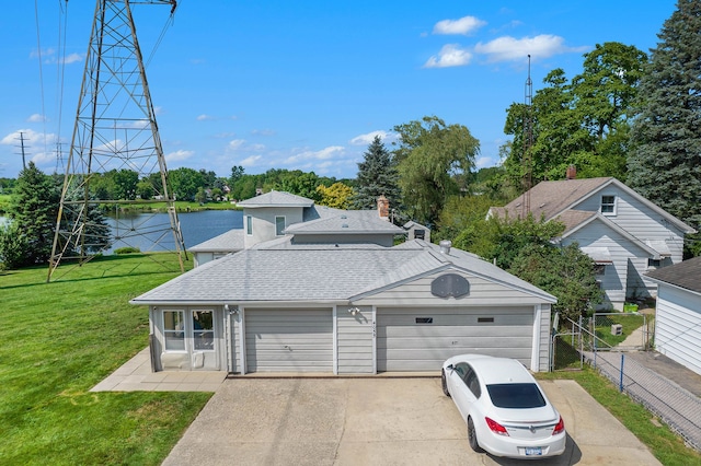 view of front of house featuring a garage, fence, a front yard, roof with shingles, and concrete driveway