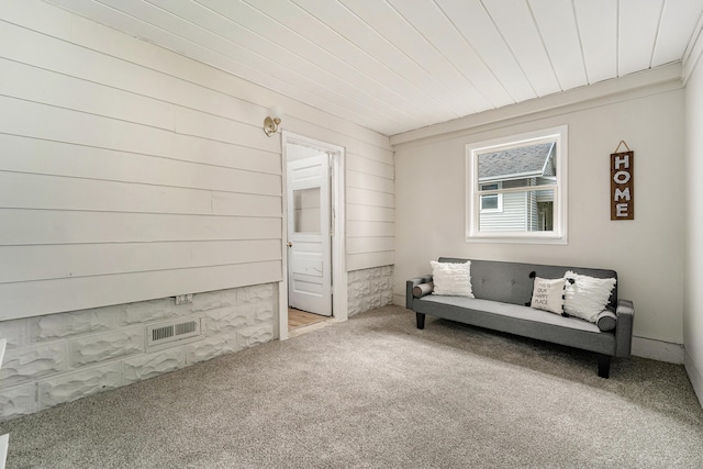 living area with carpet