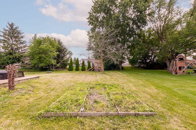 view of yard with a playground