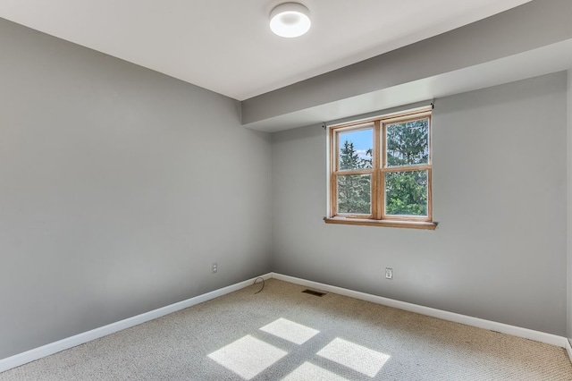 empty room featuring carpet flooring