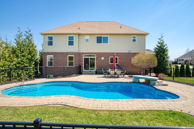 view of swimming pool featuring a fenced in pool, a patio, and fence