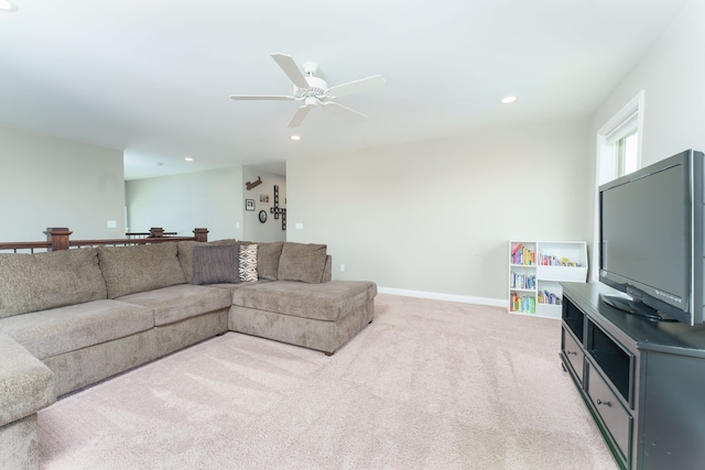 living room featuring light carpet, baseboards, recessed lighting, and ceiling fan