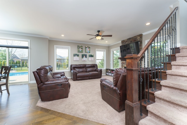 living room featuring recessed lighting, crown molding, stairs, and a ceiling fan